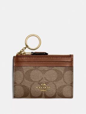 Coach Mini Skinny Id Case In Signature Canvas